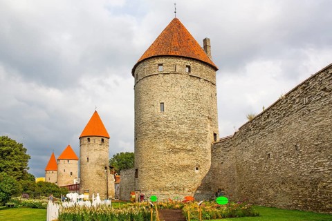 Medieval city fortification with battlements and defence towers