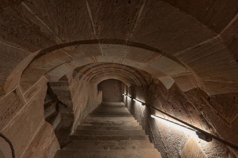 Historic staircase leading down to the vaulted cellar of the former Pellerhaus