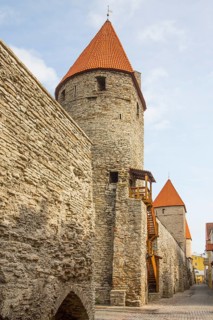 Medieval city fortification with battlements and defence towers