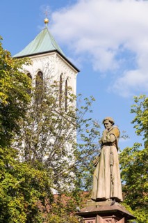 Fountain figure of Monk Berthold Schwarz on the town hall square