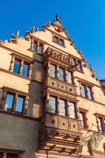 Facade of the historic La Maison des Tetes