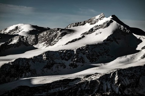 Snowy summit of Monte Cevedale at blue hour