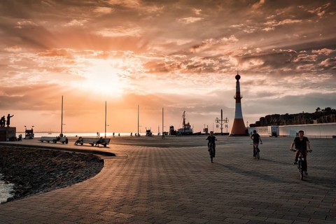 Willy-Brandt-Platz with lighthouse Unterfeuer at sunset