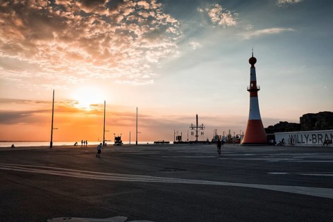 Willy-Brandt-Platz with lighthouse Unterfeuer at sunset