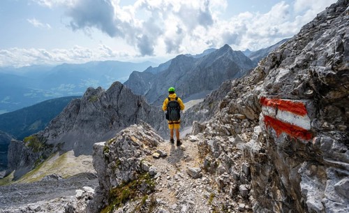 Hiker on hiking trail to Lamsenspitze