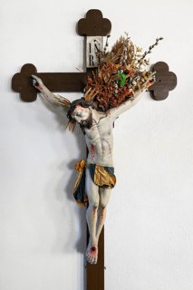 Crucified Christ with ferns and palm catkins
