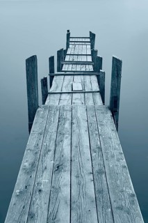 Jetty at Diessen am Lake Ammer with fog