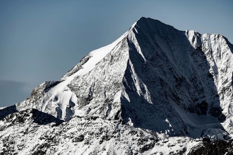 Snowy summit of the Koenigspitze at blue hour