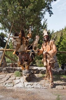 Goat herder in traditional garb