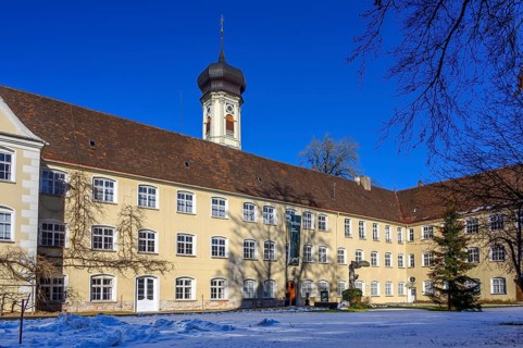 The castle from 1631 and the church tower of St. George and St. James