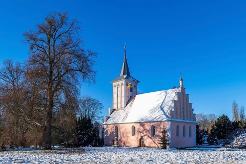 Village church in Lenne Park Criewen in winter