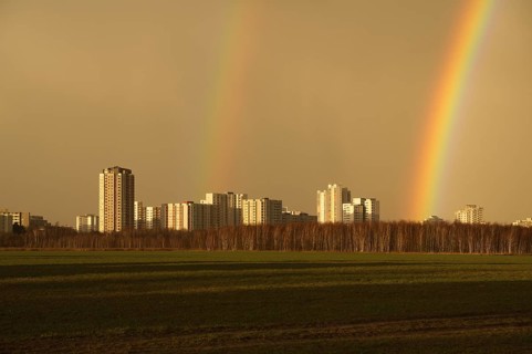 Rainbow and yellow sky over Gropiusstadt