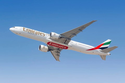 An Emirates Boeing 777-300ER aircraft with registration A6-EQV takes off from Dubai Airport