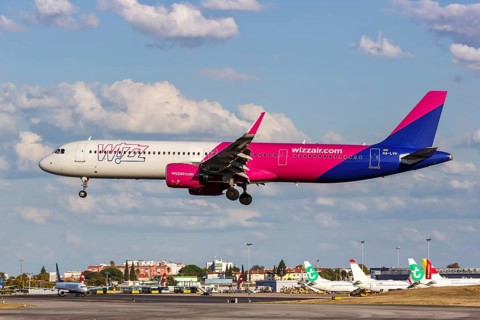 A Wizzair Airbus A321neo with registration number HA-LVH at the airport in Lisbon