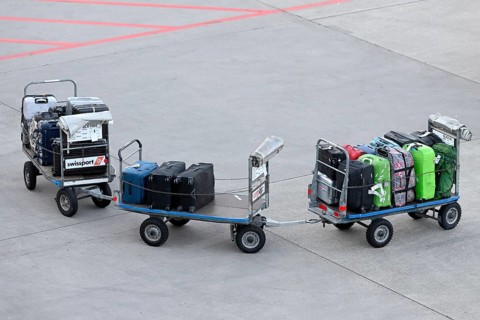 Baggage trolley with suitcase