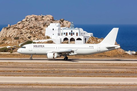 A Volotea Airbus A320 aircraft with registration number 9H-SLK at Santorini airport