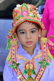 Splendidly dressed aspiring novice at novice ceremony