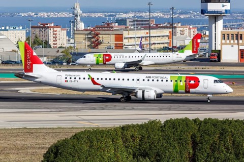 An Embraer 195 aircraft of TAP Portugal Express with registration CS-TTX at the airport in Lisbon