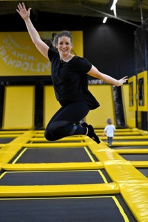 Woman at a trampoline playground