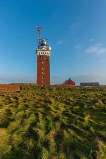 Brick lighthouse with radar antenna