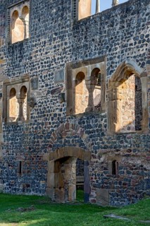 Facade of the Romanesque Muenzenberg Palas with windows and arcades