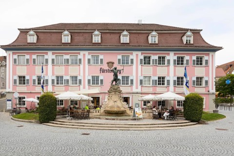 Diana Fountain in front of the Fuerstenberg Braeustueble on the Postplatz