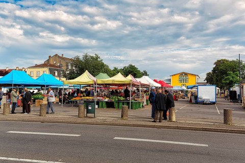 People at a weekly market market
