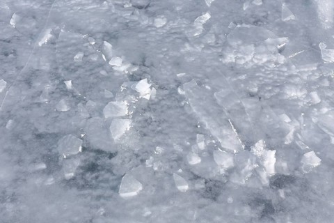Chunks of ice on a frozen surface