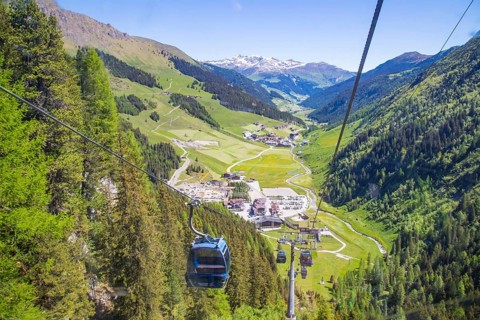 Mountain railway glacier bus above the valley station of the Hintertux glacier