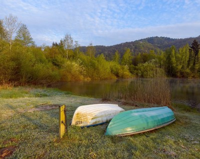 Lake with boats in the morning