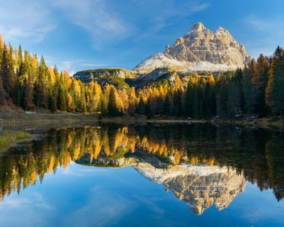 Antorno lake towards Tre Cime di Lavaredo mountain reflected in lake