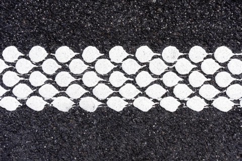 Rubbing strip or rumble strip of a road