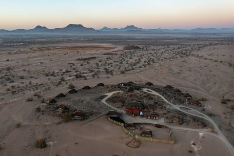 The Doro Nawas Camp and arid desert plains at the edge of the dry river bed of the Aba-Huab river