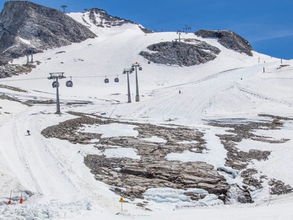 Glacier polish under melted ski slope
