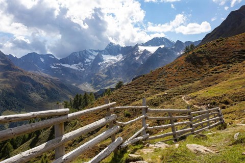 Hiking trail with pasture fence
