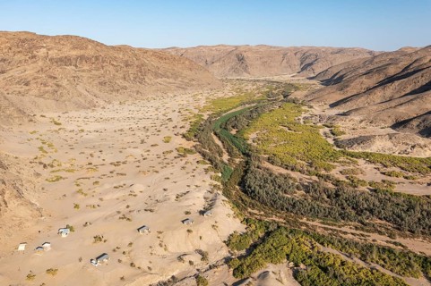 The Elephant Song campsite at the edge of a swampy stretch of the Hoanib river