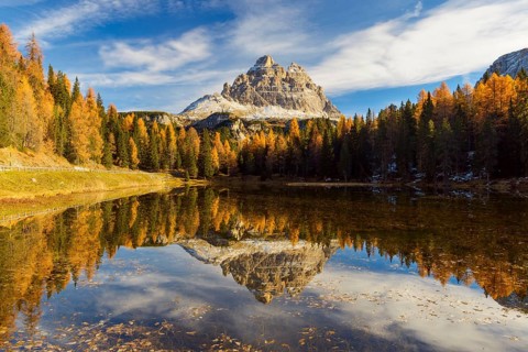Antorno lake towards Tre Cime di Lavaredo mountain reflected in lake