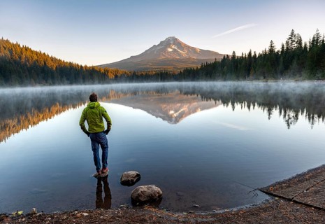 Young man standing on stone