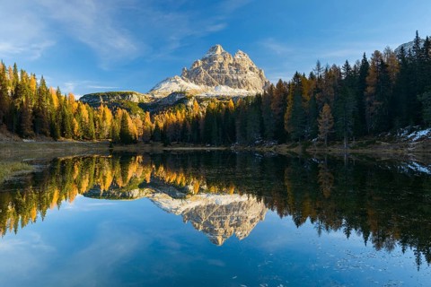 Antorno lake towards Tre Cime di Lavaredo mountain reflected in lake