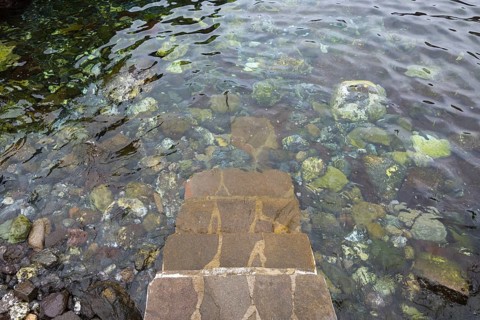 Stairs to natural swimming pool