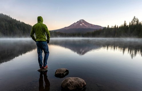 Young man standing on stone