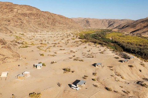 The Elephant Song campsite at the edge of a swampy stretch of the Hoanib river