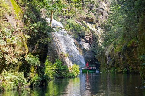 Boat at the waterfall in the Edmundsklamm