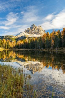Antorno lake towards Tre Cime di Lavaredo mountain reflected in lake