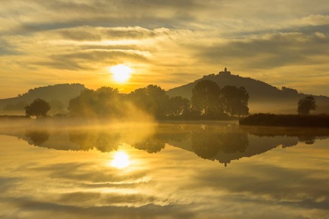 Wachsenburg Castle at Sunrise Reflecting in Lake