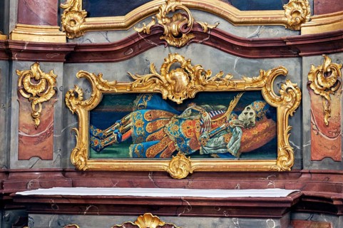 Reliquary of a side altar artfully framed in rocaille frames