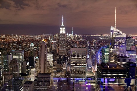 View of Midtown and Downtown Manhattan and Empire State Building from Top of the Rock Observation Center at sunset