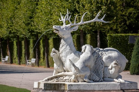 Gargoyle deer figure in the palace garden at Schwetzingen Palace