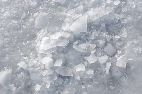 Chunks of ice on a frozen surface