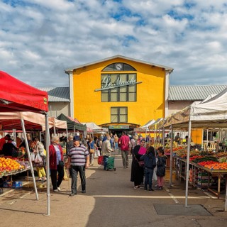 People at a weekly market market